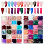 24-color full cover press on nail tips set with assorted artificial nails neatly organized in storage boxes for DIY nail art.