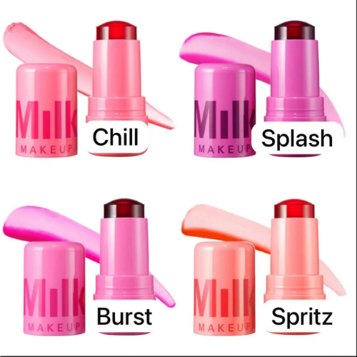 HUDA MOJI colorful lipstick collection featuring pink, coral, and red lipstick tubes with matching product packaging arranged on a soft pastel background.