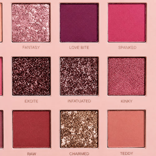 Huda Beauty The New Nude Eyeshadow Palette with nude, pink, mauve, and glitter shades