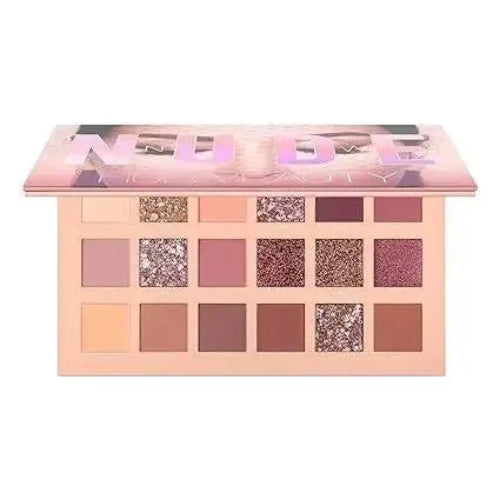 Huda Beauty The New Nude Eyeshadow Palette with nude, pink, mauve, and glitter shades