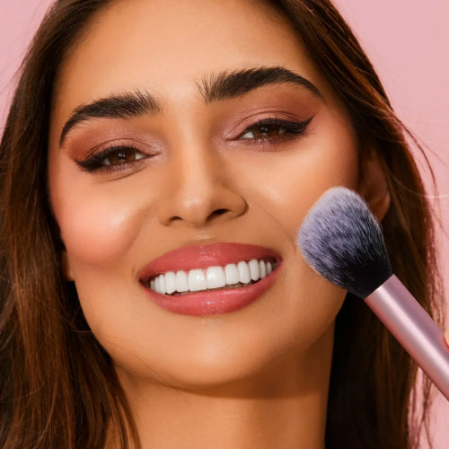 Real Techniques blush brush with soft synthetic bristles for applying blush and bronzer