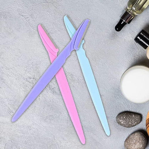 Colorful facial hair removal razors shown in purple, pink, and blue, with illustrations demonstrating precise eyebrow, upper lip, and facial hair grooming.