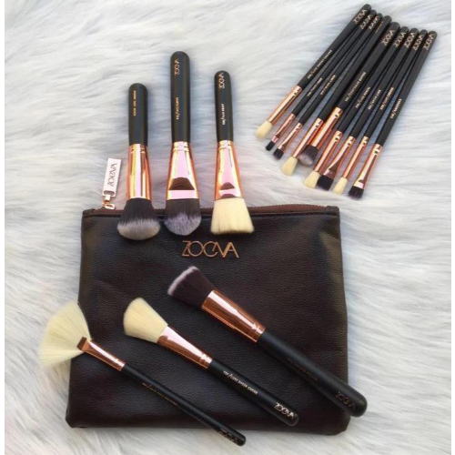Zoeva 15-piece professional rose gold makeup brush set with soft face and eye brushes in a black travel pouch for flawless makeup 