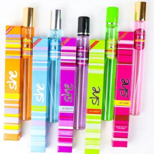 Colorful She pocket perfume collection featuring mini long-lasting fragrance bottles and matching perfume boxes in assorted scents.
