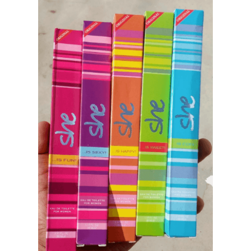 Colorful She pocket perfume collection featuring mini long-lasting fragrance bottles and matching perfume boxes in assorted scents.