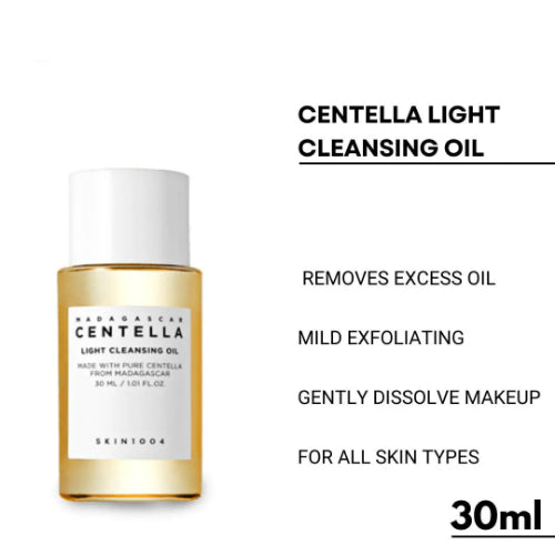 SKIN1004 Madagascar Centella Light Cleansing Oil bottle with pump and matching product box on a softly lit neutral background.